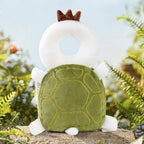Bibbito Head Cushion in the Green Turtle design, a soft green plush turtle cushion with a breathable mesh ring