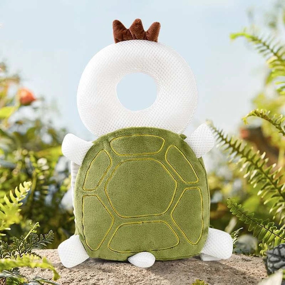 Bibbito Head Cushion in the Green Turtle design, a soft green plush turtle cushion with a breathable mesh ring